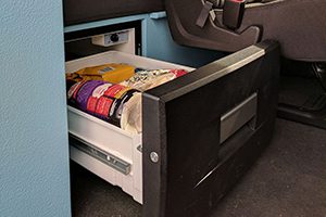 a small compartment in the back of a car.